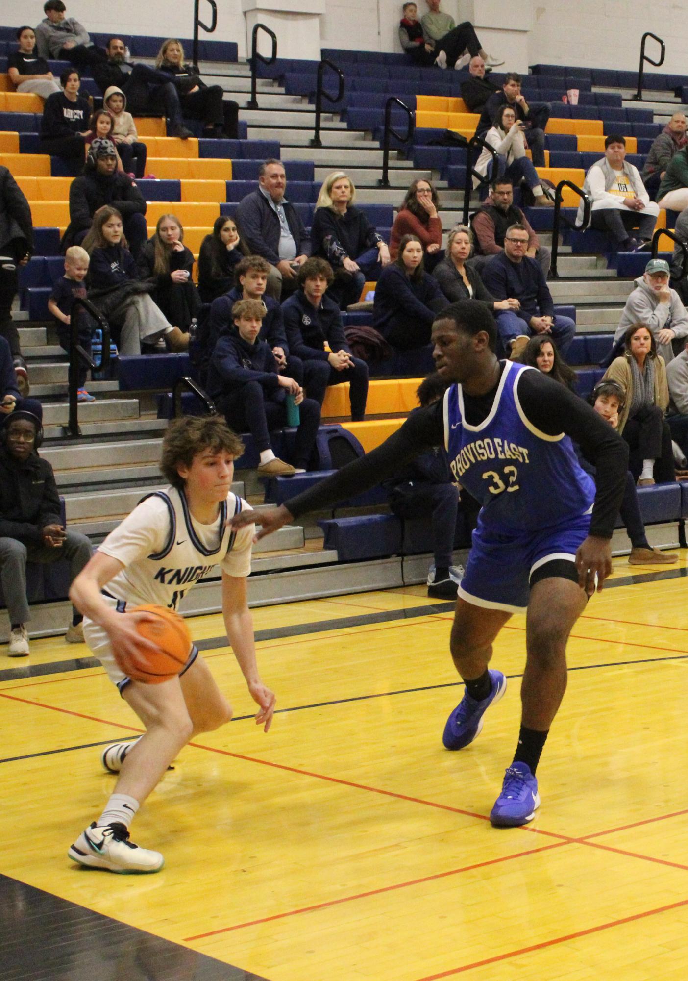 Boys basketball wins 63-59 over Proviso East during MSL/WSC crossover game