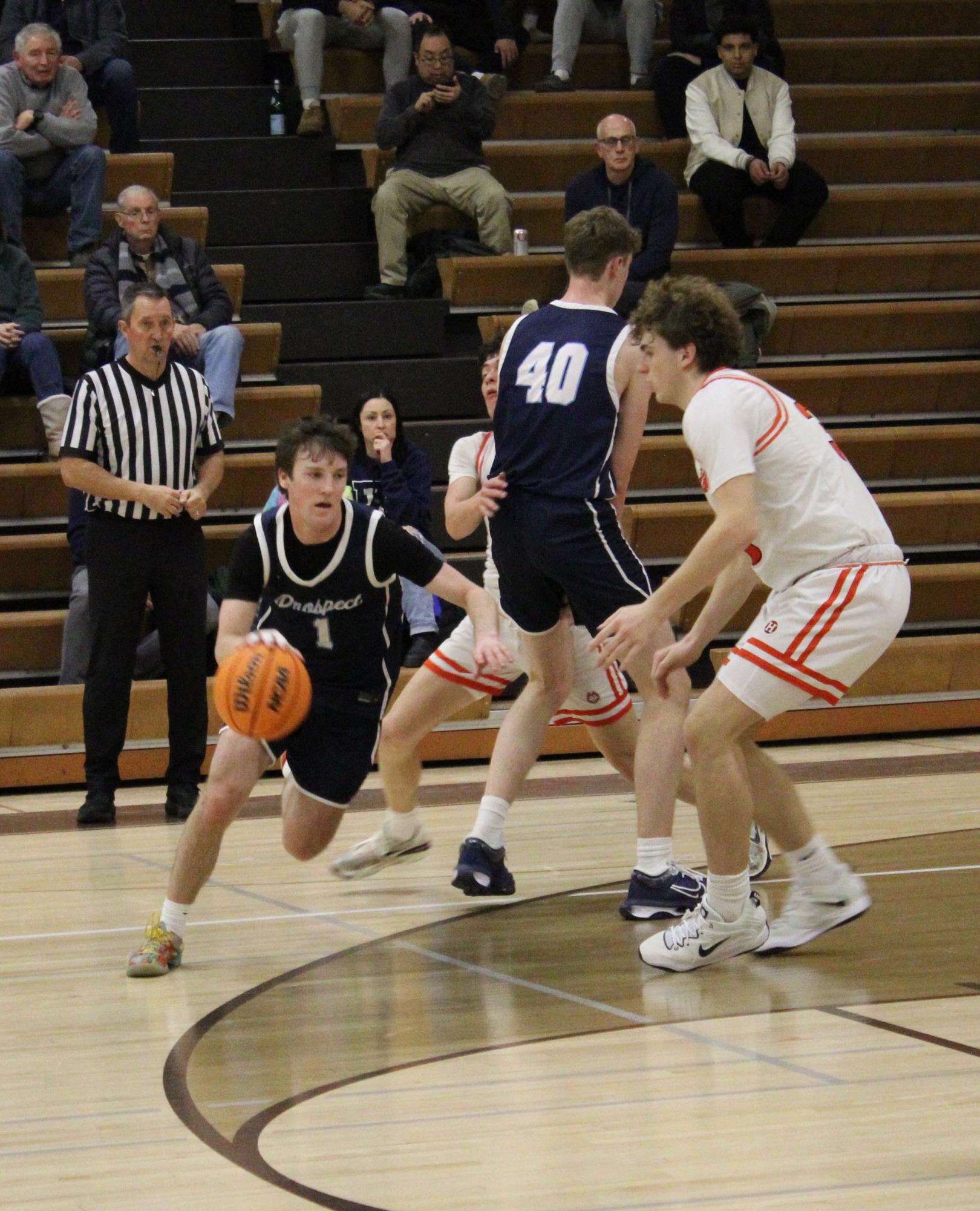 Boys’ Basketball win crosstown game over Hersey, 56-41