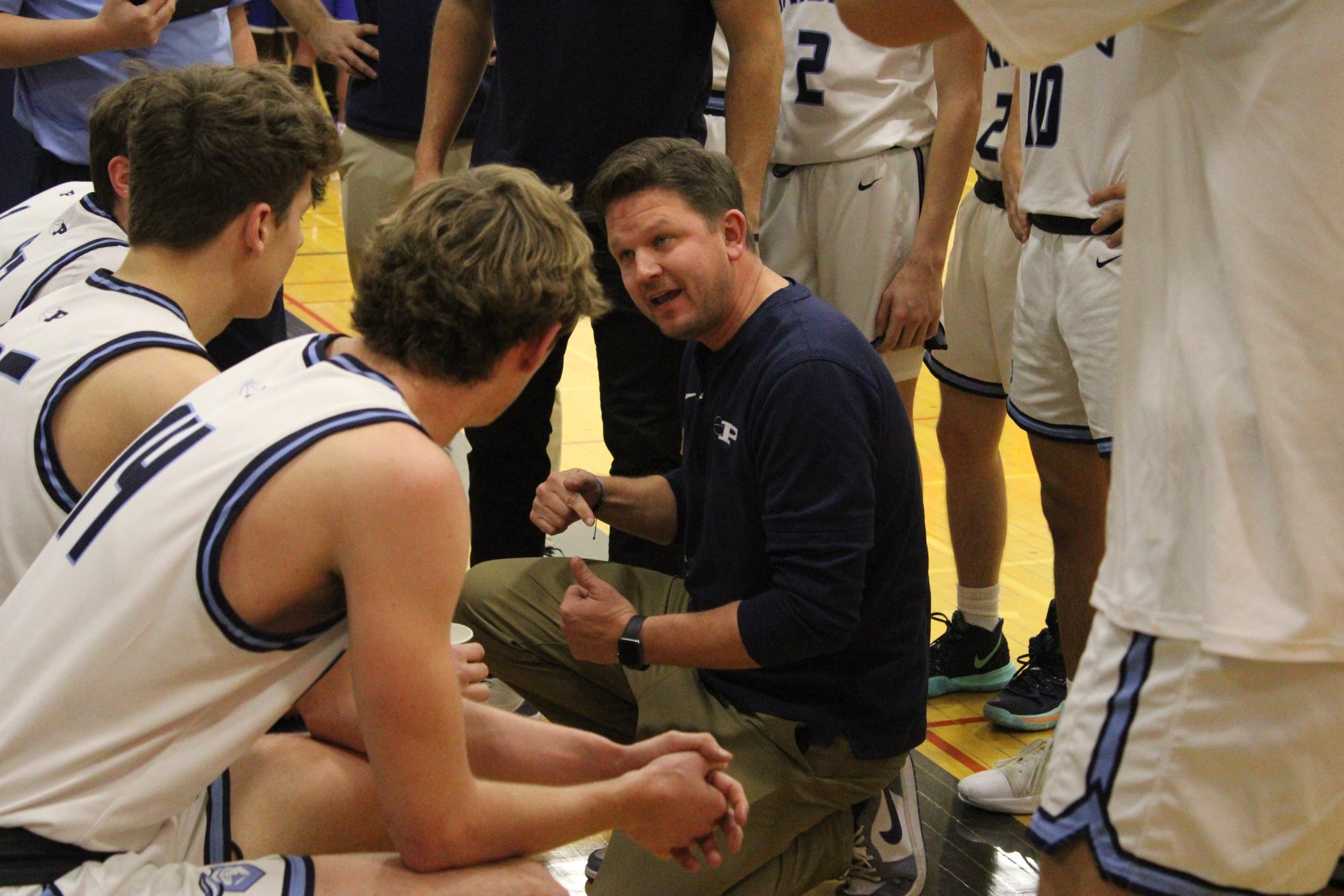 Boys basketball wins 63-59 over Proviso East during MSL/WSC crossover game