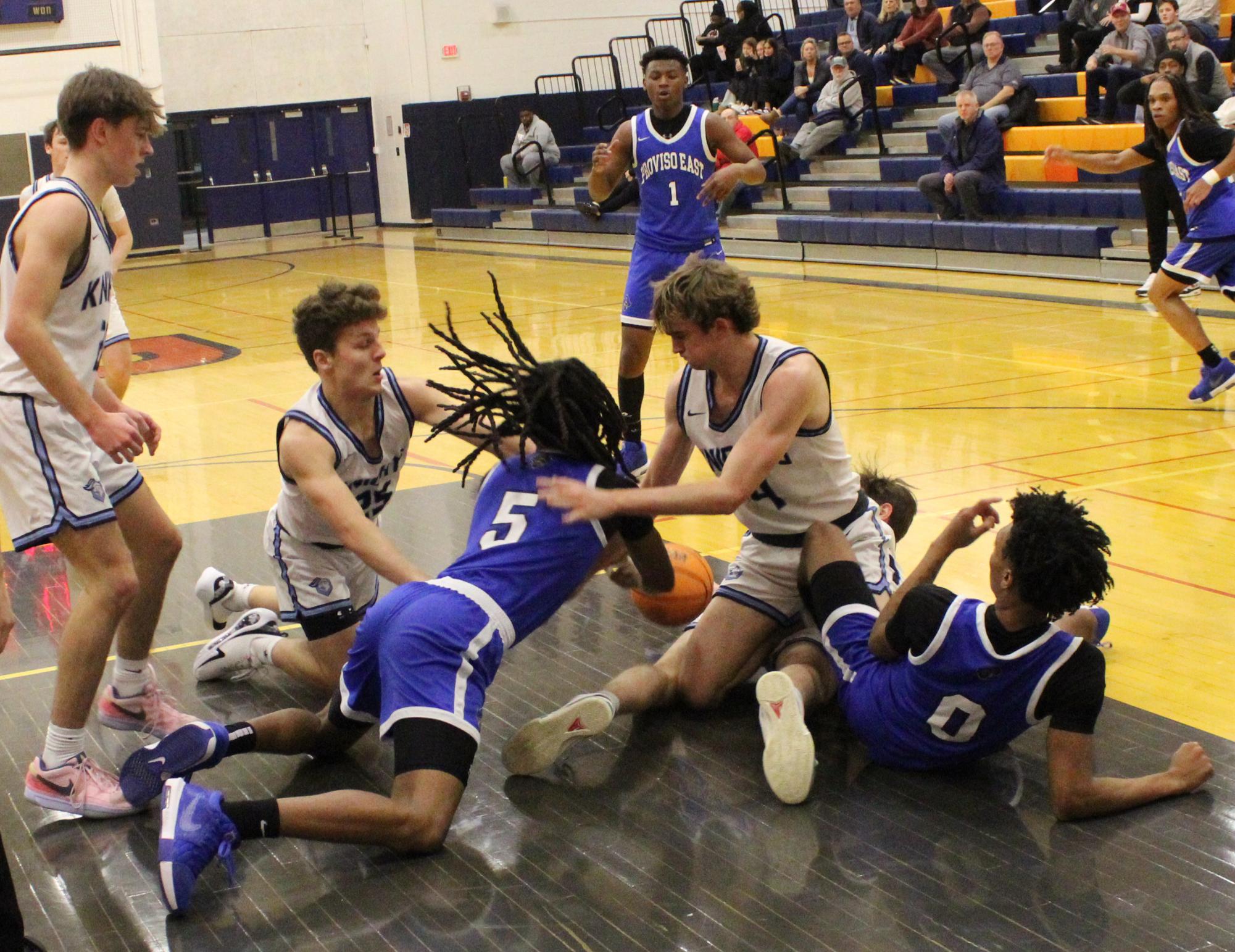 Boys basketball wins 63-59 over Proviso East during MSL/WSC crossover game