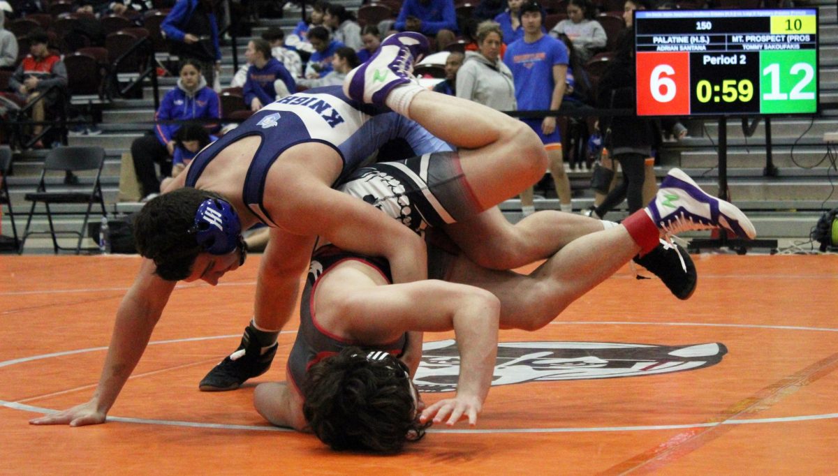 Junior Tommy Sakoufakis during his preliminary round bout.