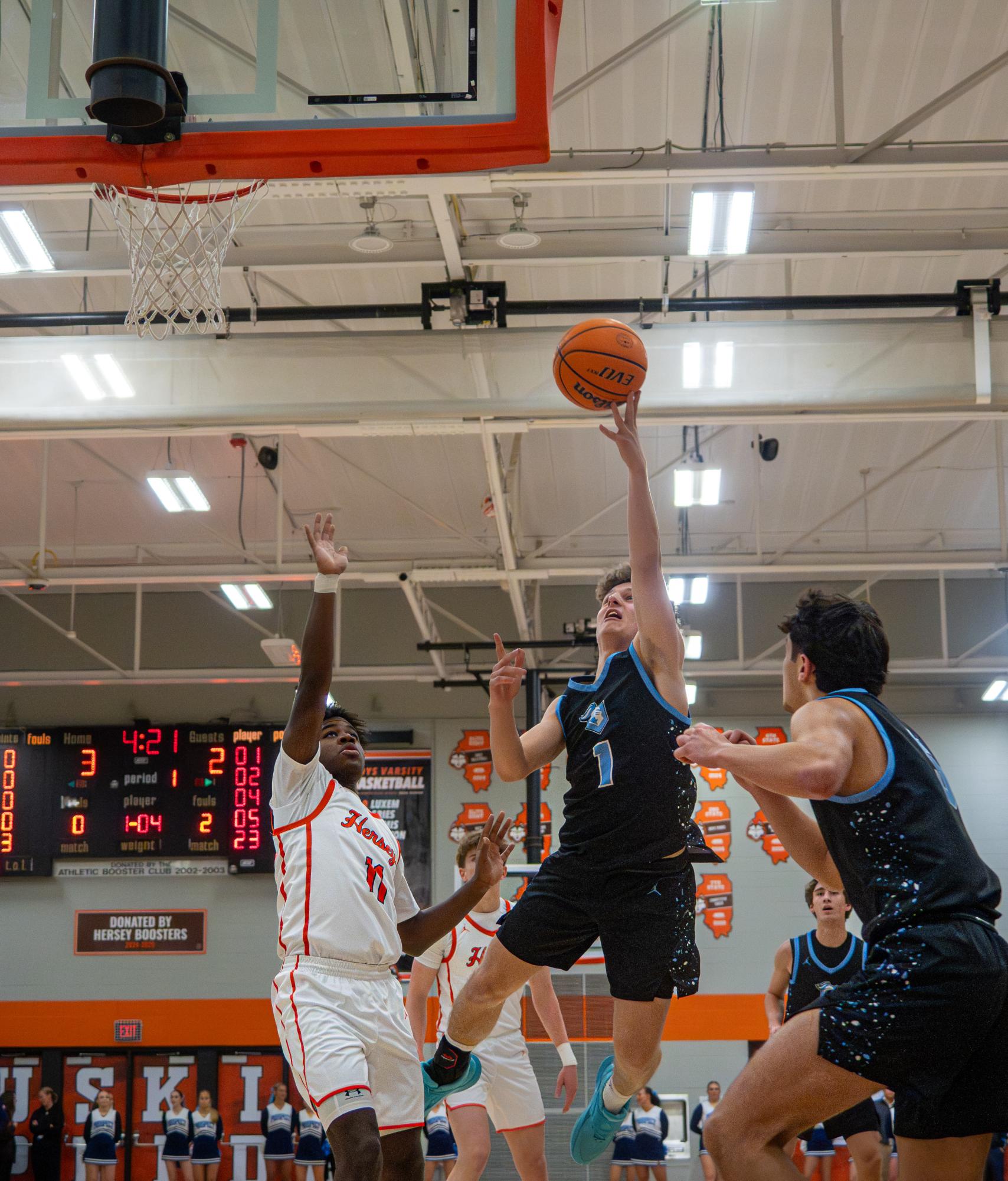 Boys basketball falls 55–37 to rival Hersey.