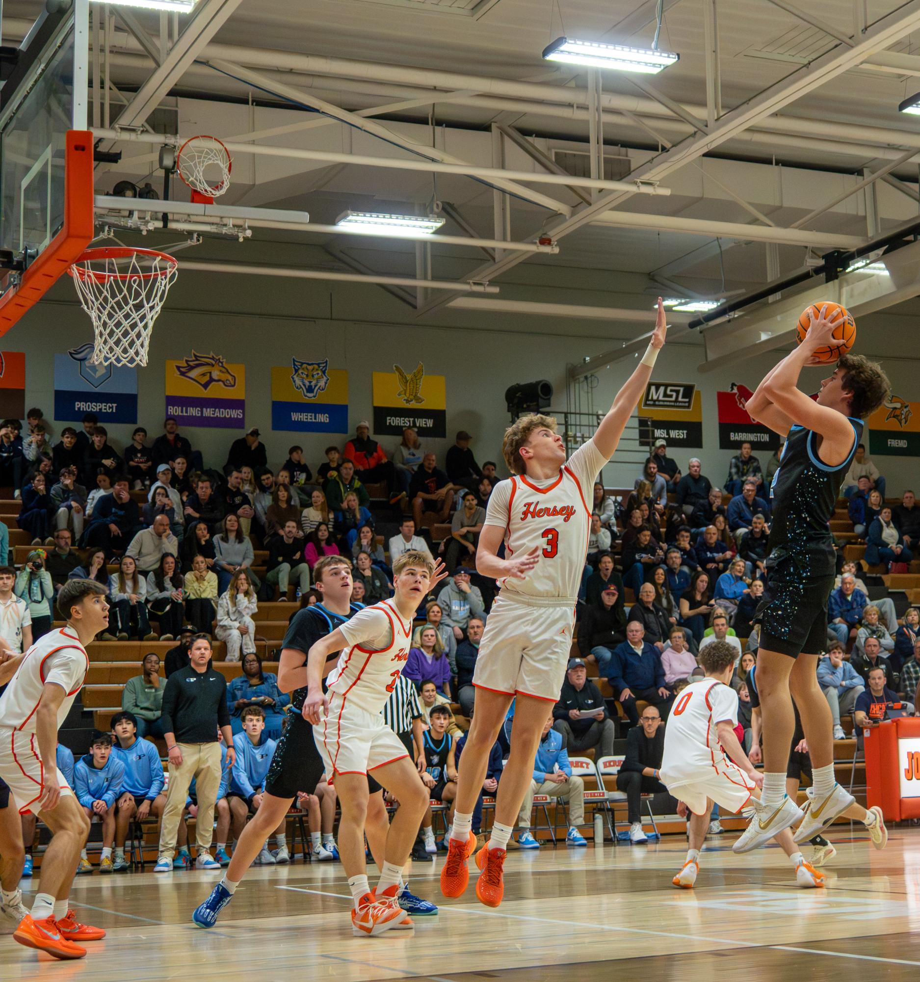 Boys basketball falls 55–37 to rival Hersey.