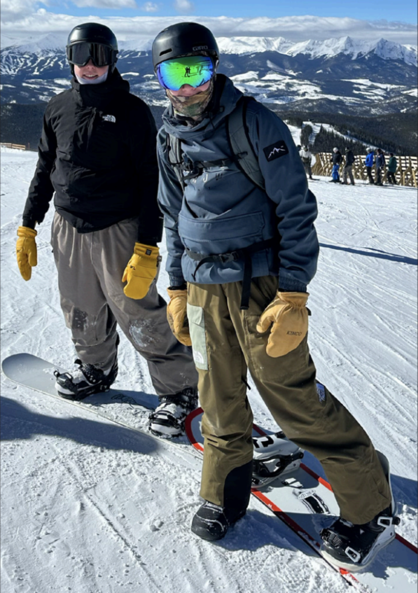 WEATHER: Junior Dominik
Janiczek (right) snowboards at
Wilmot Mountain Ski Resort on
Jan. 17. He loves snowboarding
but has gotten fewer
opportunities to do so recently
due to warming weather.