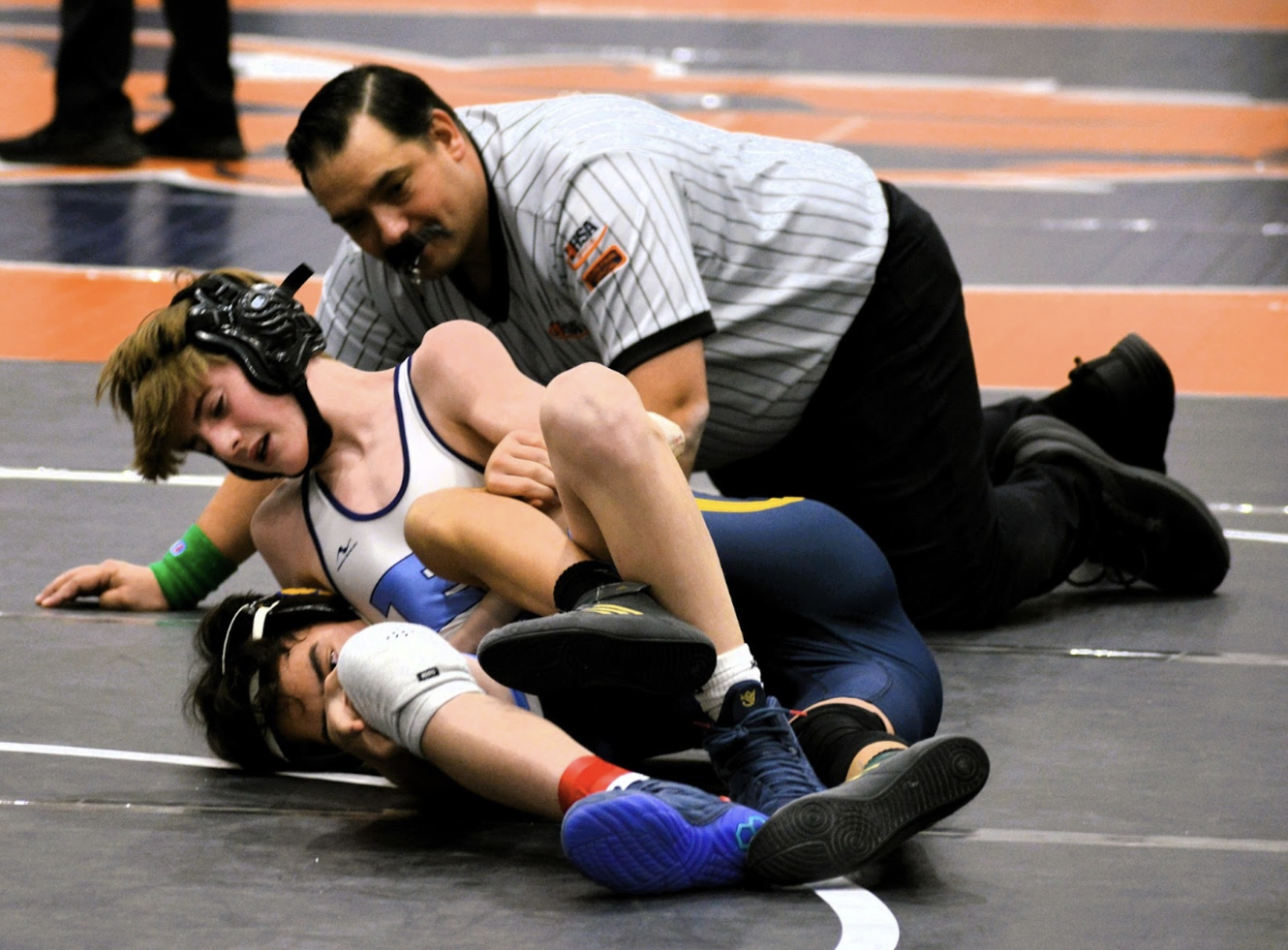 Sophomore Benjamin Grund wrestling at Forest View regionals (photo courtesy of Ashton Brown)
