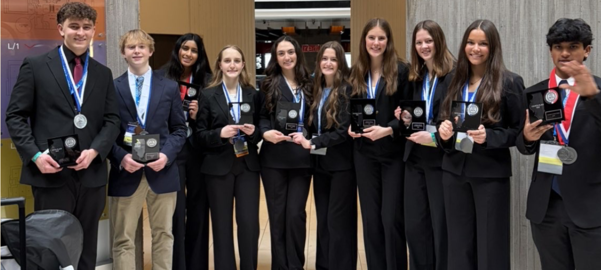 DECA competes in state, brings home 10 national qualifiers