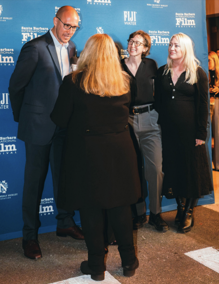 PRESS: (Left to right) College World Religions teacher John
Camardella, director Allison Walsh and editor Alanna Schmelter
were interviewed on the Santa Barbara International Film Festival
red carpet about the documentary.